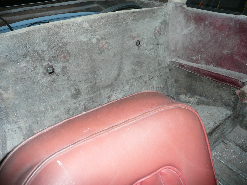 Rear seat with exposed fibre glass shell